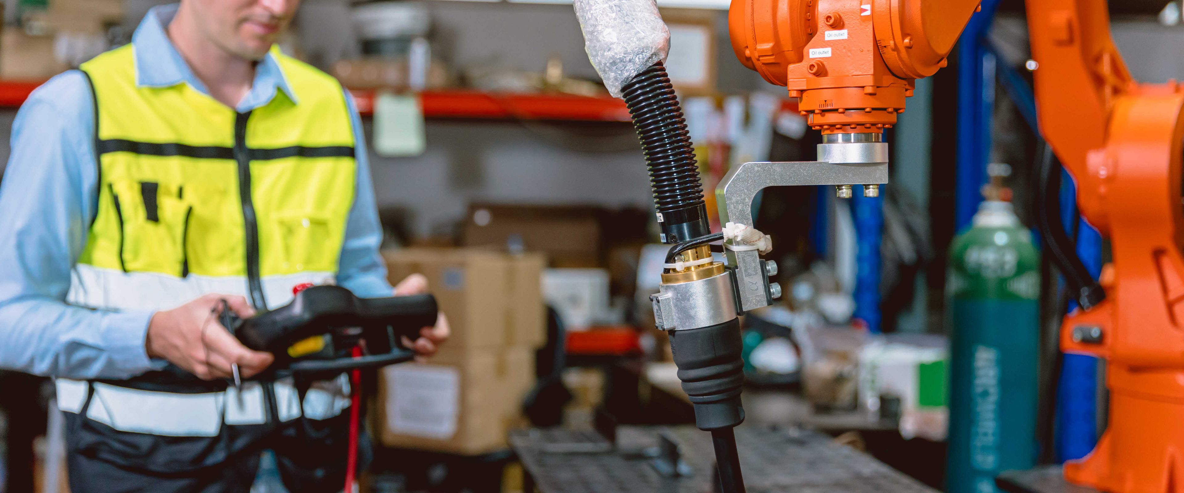 Man wearing helmet in production environment