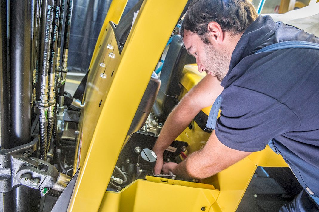 Employee working on machine